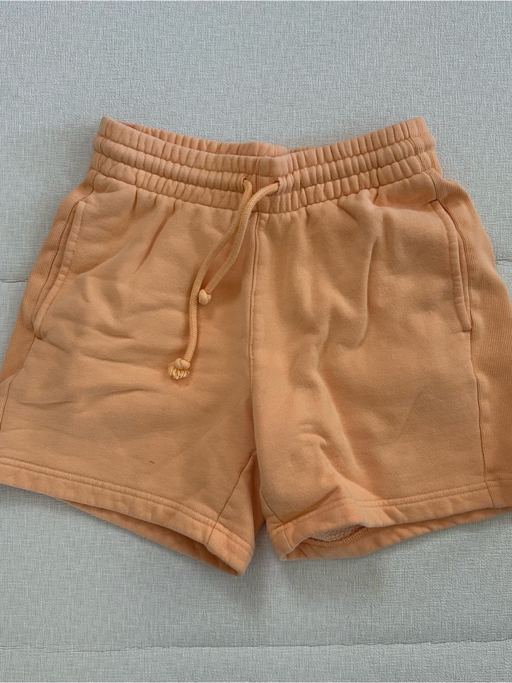 Aritzia TNA cozy orange drawstring 5” sweat shorts
